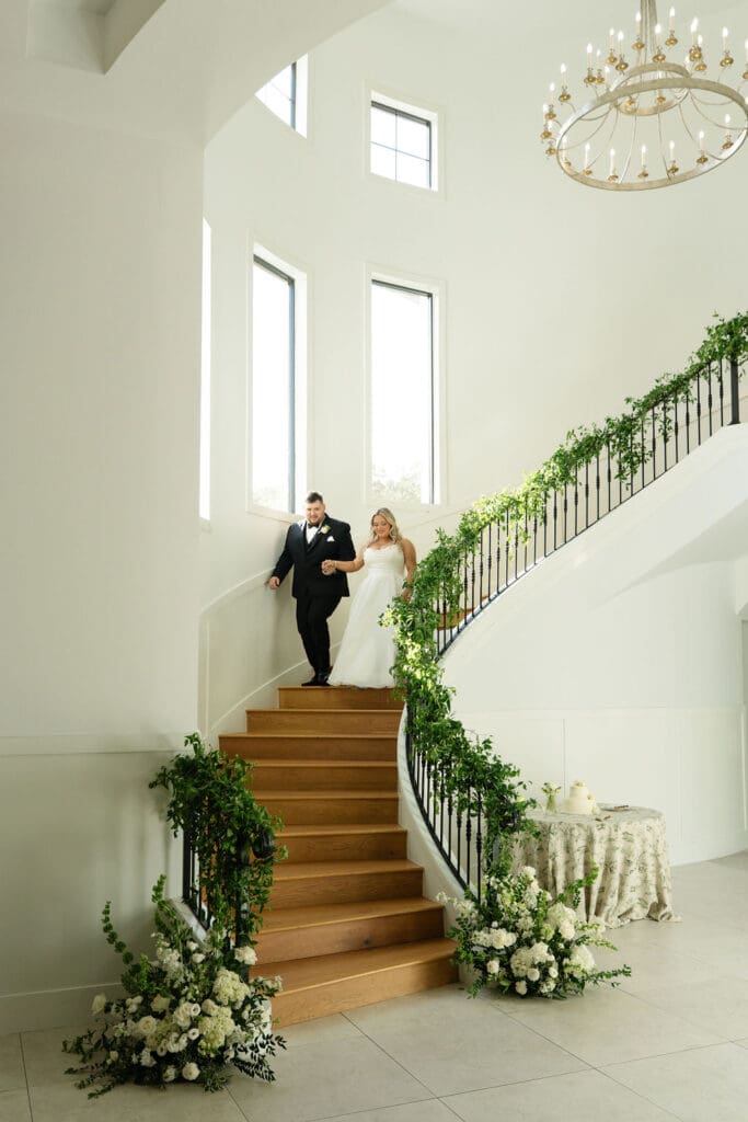 A newly married couple on the staircase at the Preserve at Canyon Lake