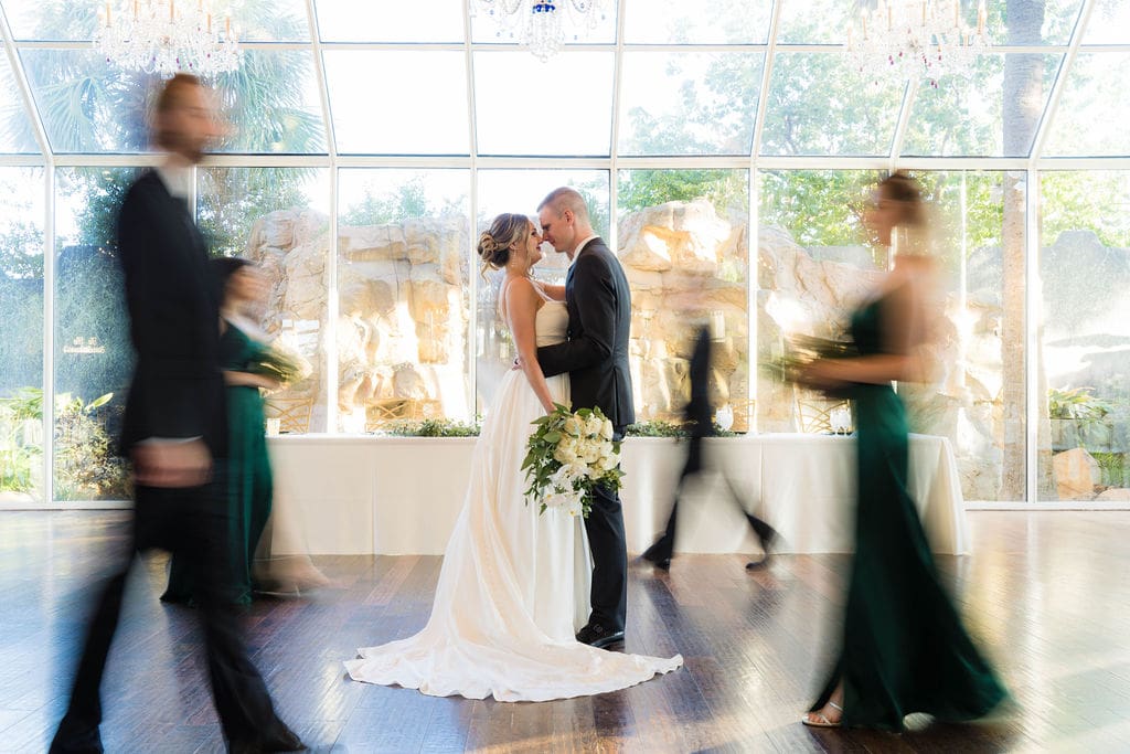 newlywed couple taking a moment on their wedding day