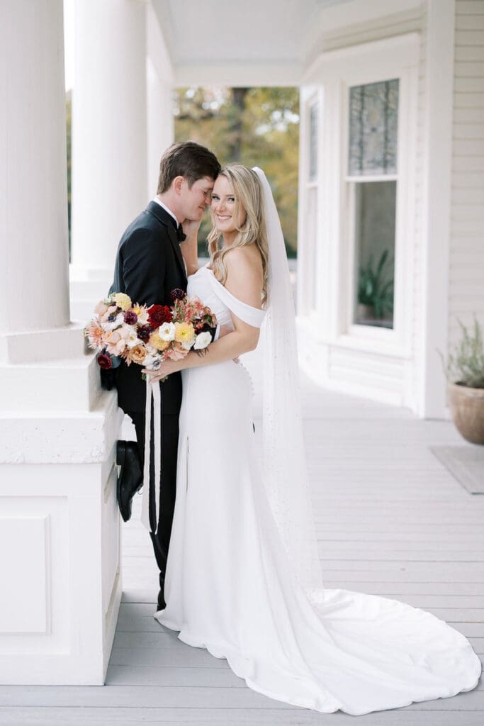 thankful wedding planners taking a moment with this new husband and wife