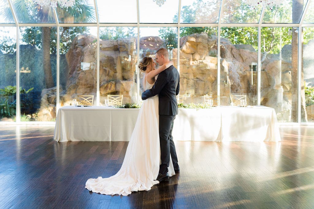 Newlywed couple dancing before rececption